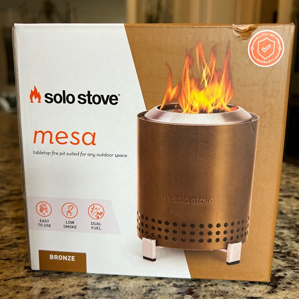 Solo Stove Bronze Mesa tabletop fire pit.